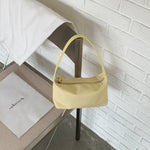 Sac baguette en nylon — poche zippée intérieure et porte-carte