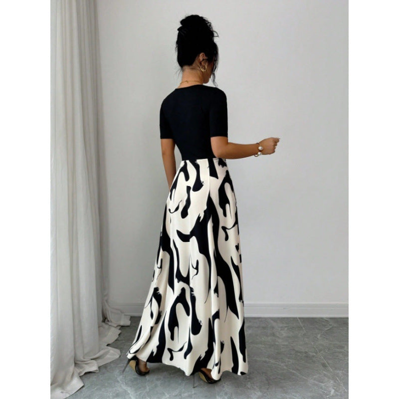 Robe longue bicolore, haut uni et jupe imprimée