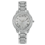 Montre femme pavée de strass, cadran étoilé et bracelet métal