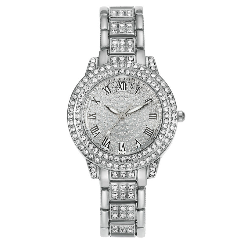 Montre femme pavée de strass, cadran étoilé et bracelet métal