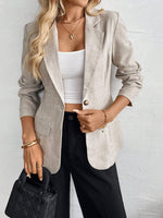 Blazer à col cranté et poches à rabat