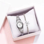 Montre femme fine sertie de strass, bracelet acier