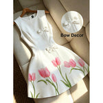 Robe courte à pois et nœuds, coupe trapèze — coloris