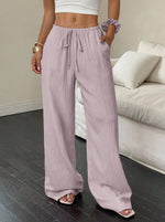 Pantalon large en gaze froissée, taille à cordon
