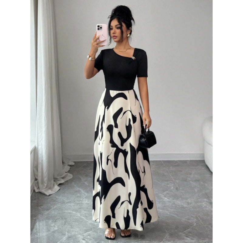 Robe longue bicolore, haut uni et jupe imprimée