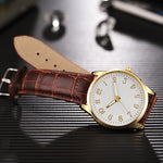 Montre homme classique dorée à bracelet cuir