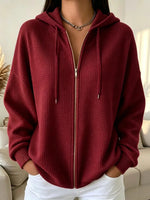Gilet zippé à capuche en maille gaufrée