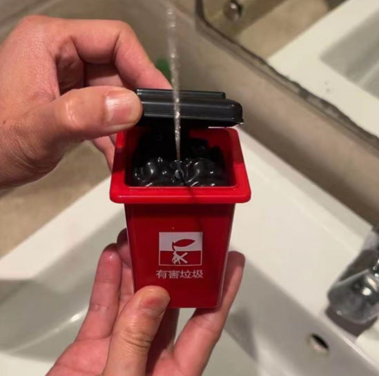 Pistolet à eau en forme de poubelle — jouet d’extérieur