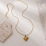Collier cœur sur chaîne forçat — acier inoxydable 304, doré ou acier