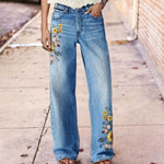 Pantalon large en denim délavé à broderie fleurie