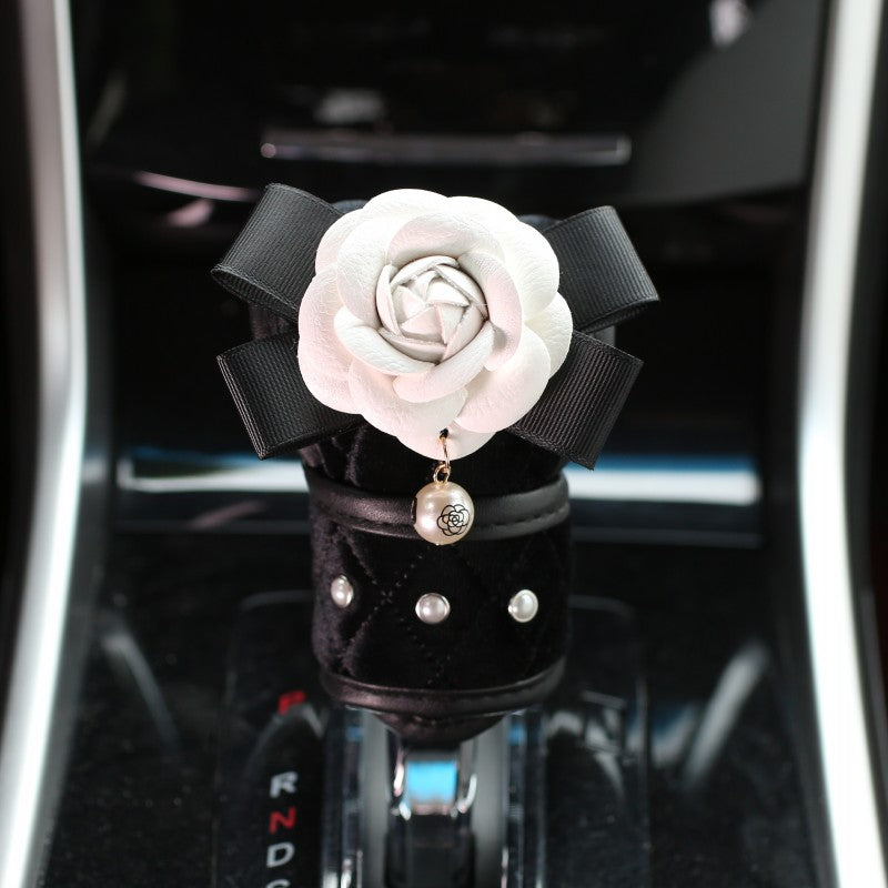 Housse de ceinture matelassée à fleur de camélia