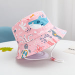 Bob bébé réversible en coton — jugulaire réglable — coloris