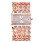 Montre femme rectangulaire à strass et large bracelet ajouré