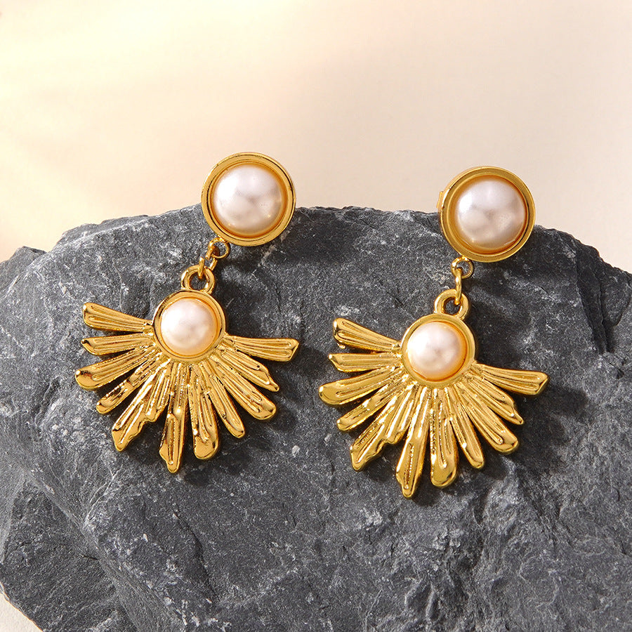 Boucles d’oreilles pendantes soleil — acier doré