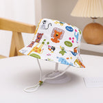 Bob bébé réversible en coton — jugulaire réglable — coloris
