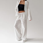 Ensemble d'intérieur en plumetis, veste ouverte et pantalon
