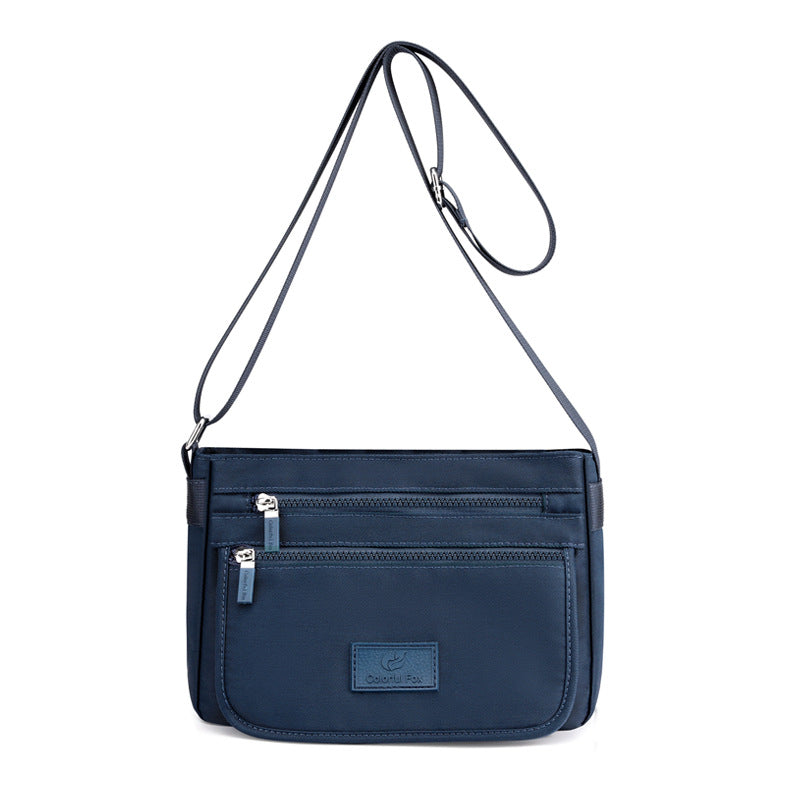 Sac femme à ligne structurée — anse courte et bandoulière — coloris