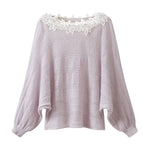 Pull épaules dénudées en maille ajourée