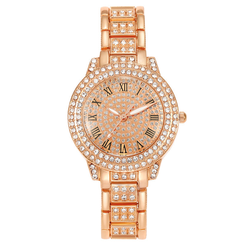 Montre femme pavée de strass, cadran étoilé et bracelet métal