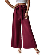 Pantalon large taille haute à ceinture nouée — tissu fluide — coloris