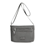Sac femme à ligne structurée — anse courte et bandoulière — coloris
