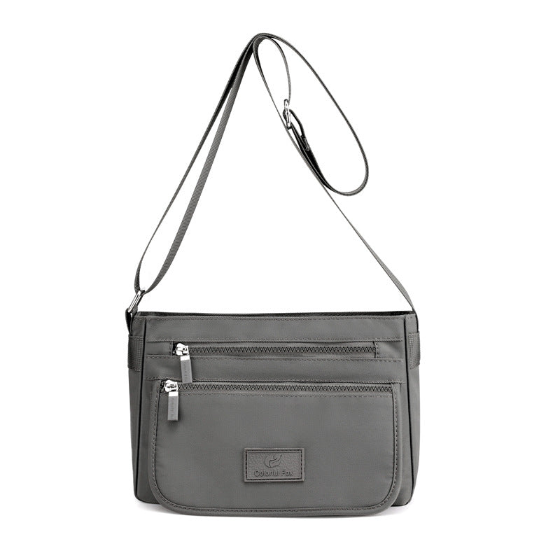 Sac femme à ligne structurée — anse courte et bandoulière — coloris