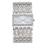 Montre femme rectangulaire à strass et large bracelet ajouré — coloris