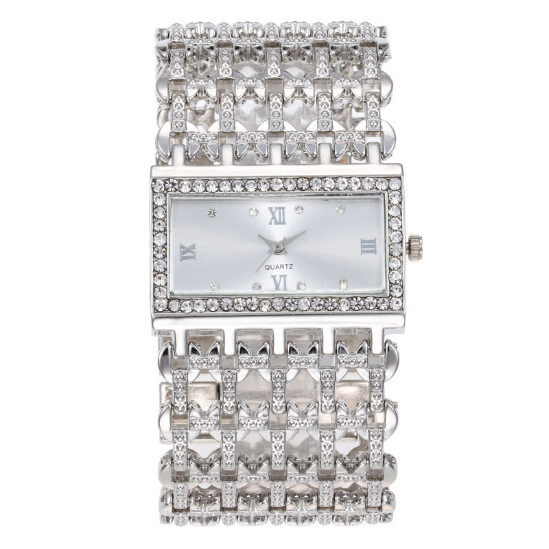 Montre femme rectangulaire à strass et large bracelet ajouré — coloris