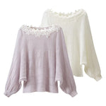 Pull épaules dénudées en maille ajourée