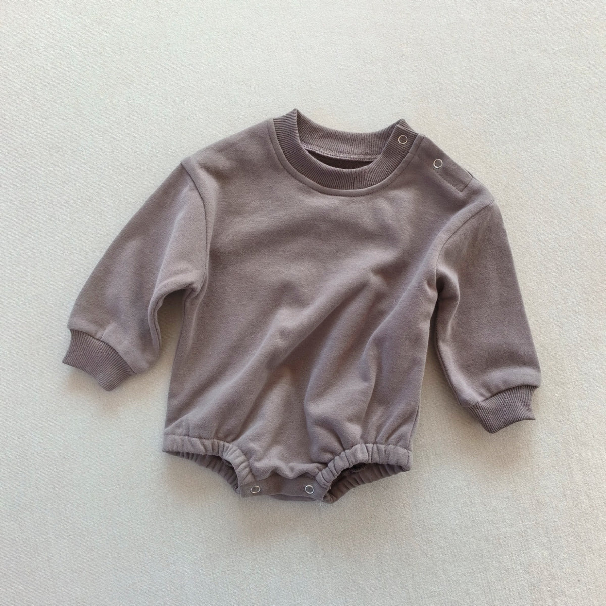 Combinaison bébé unie en coton — manches longues