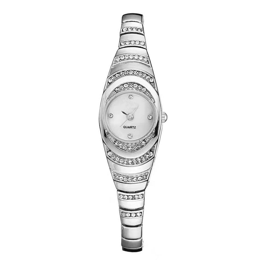 Montre femme fine sertie de strass, bracelet acier