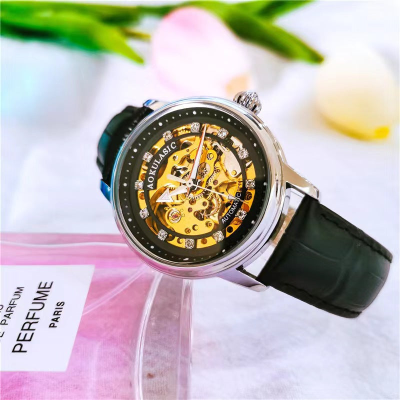 Montre femme mécanique à cadran squelette et bracelet cuir — coloris