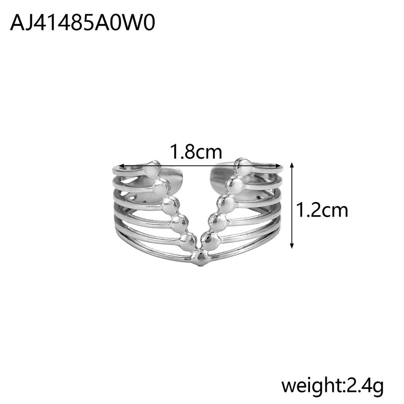 Bague dorée en acier titane — ajourée, torsadée ou sculptée — coloris