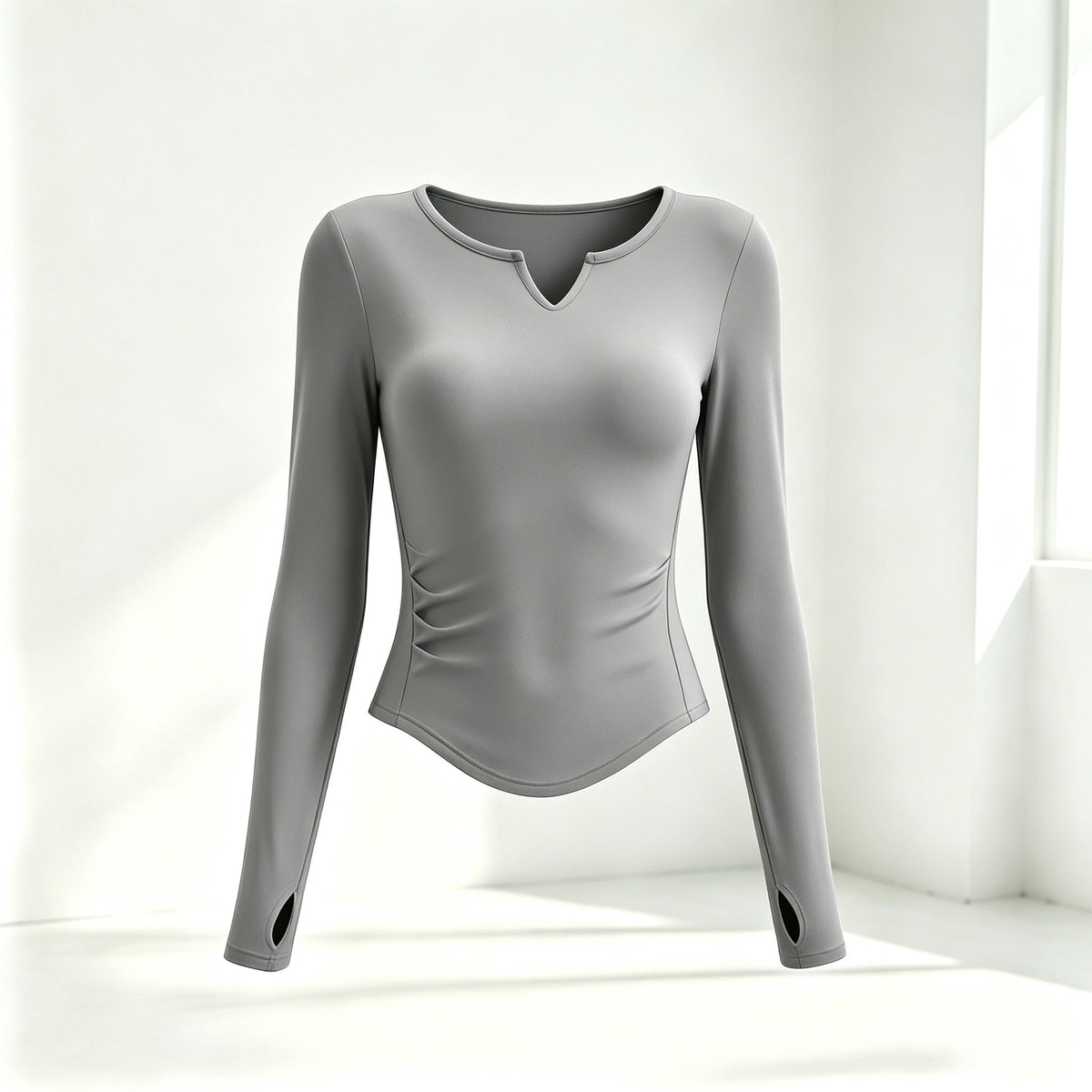 Top ajusté à fronces de taille et ourlet arrondi — coloris