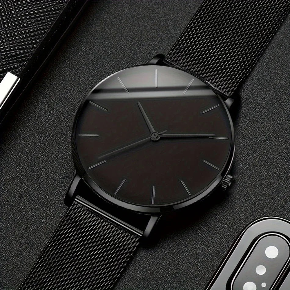 Montre homme noire ultra-fine, bracelet milanais