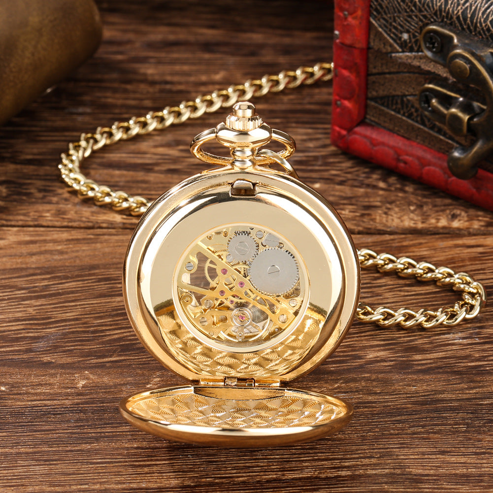 Montre de poche dorée à remontage manuel, décor gravé