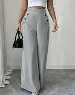 Pantalon large rayé, taille haute à boutons dorés