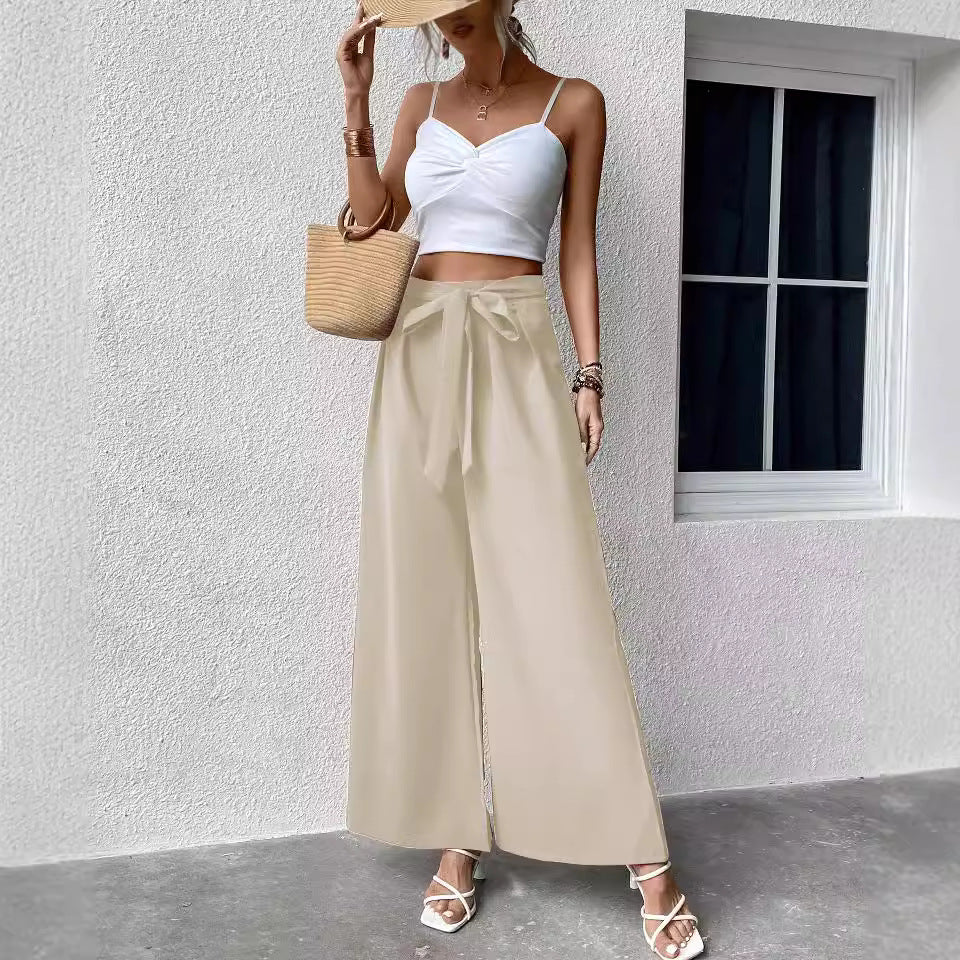 Pantalon large taille haute à ceinture nouée — tissu fluide