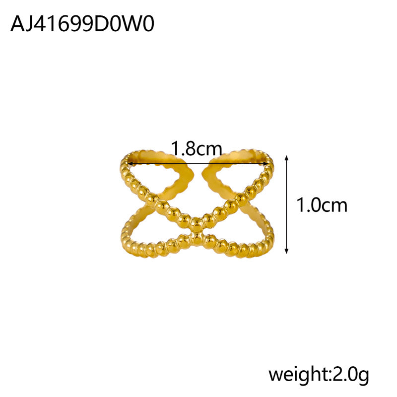 Bague dorée en acier titane — ajourée, torsadée ou sculptée — coloris