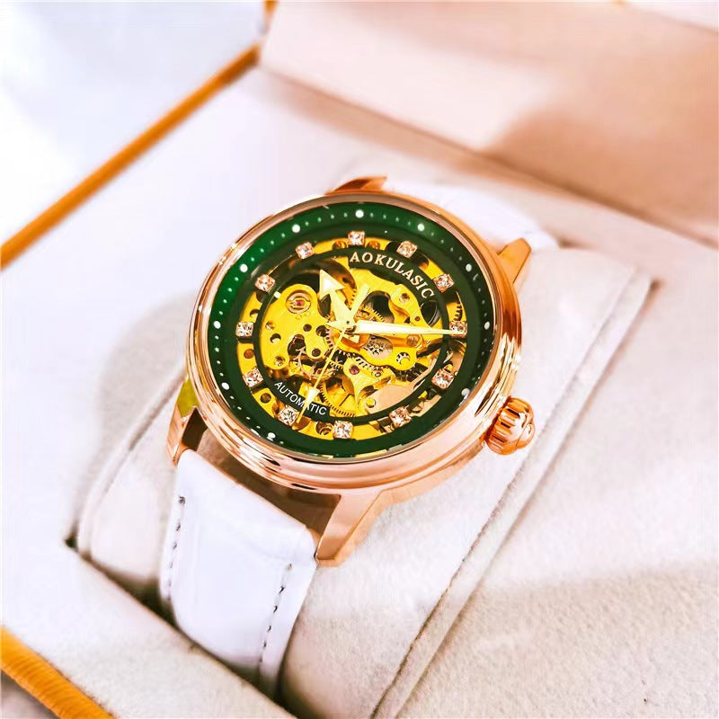 Montre femme mécanique à cadran squelette et bracelet cuir — coloris