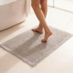 Tapis de bain gaufré à franges — polyester doux