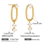 Boucles d’oreilles ovales dorées serties de zircon blanc