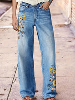 Pantalon large en denim délavé à broderie fleurie