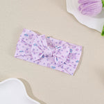 Bandeau bébé à nœud en nylon souple — 16 × 8 cm — coloris