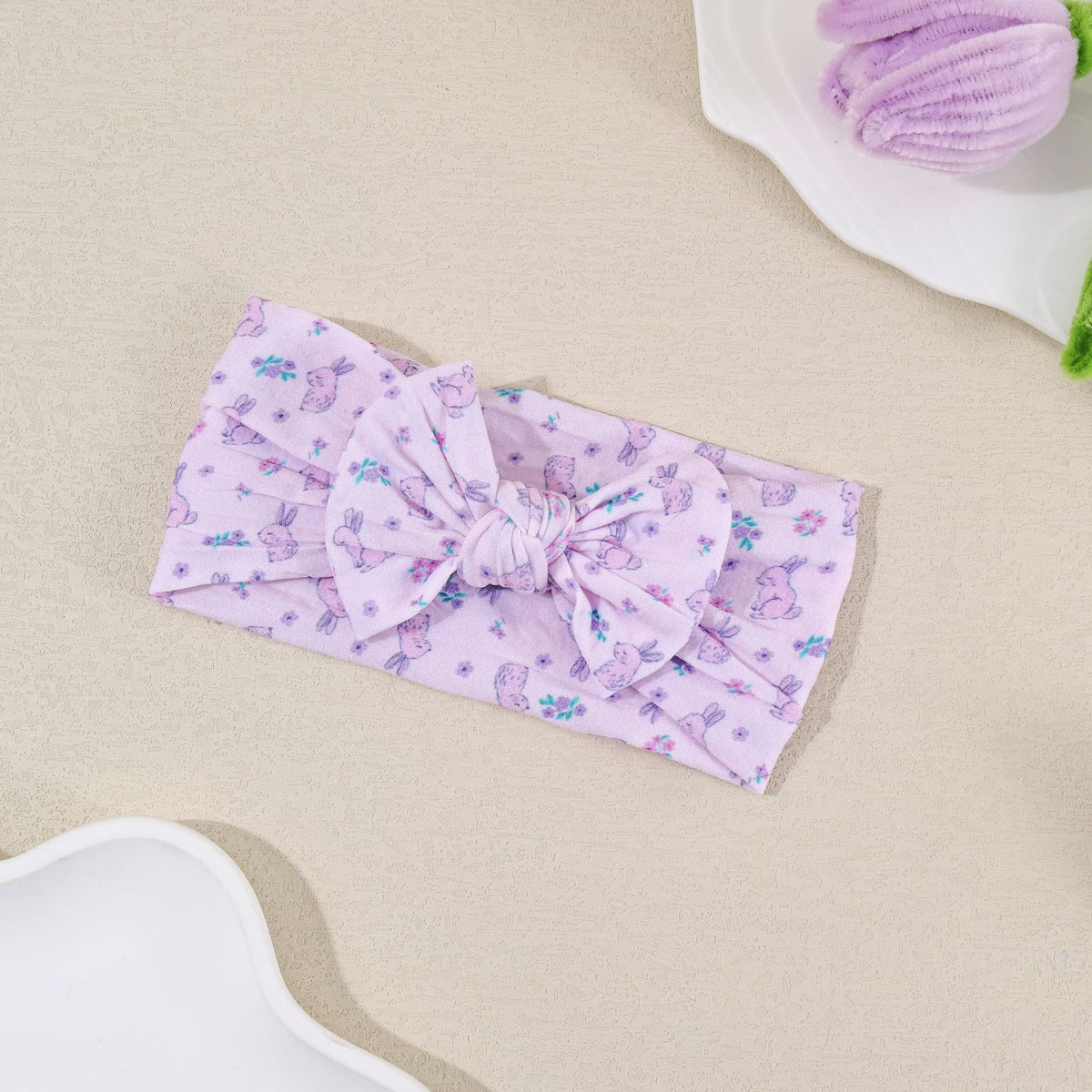 Bandeau bébé à nœud en nylon souple — 16 × 8 cm — coloris