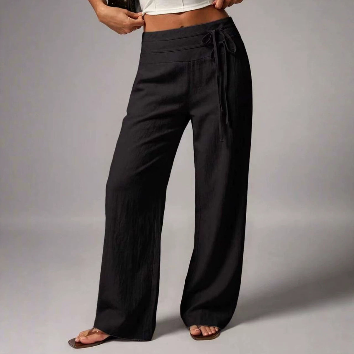 Pantalon large taille haute, ceinture à nouer