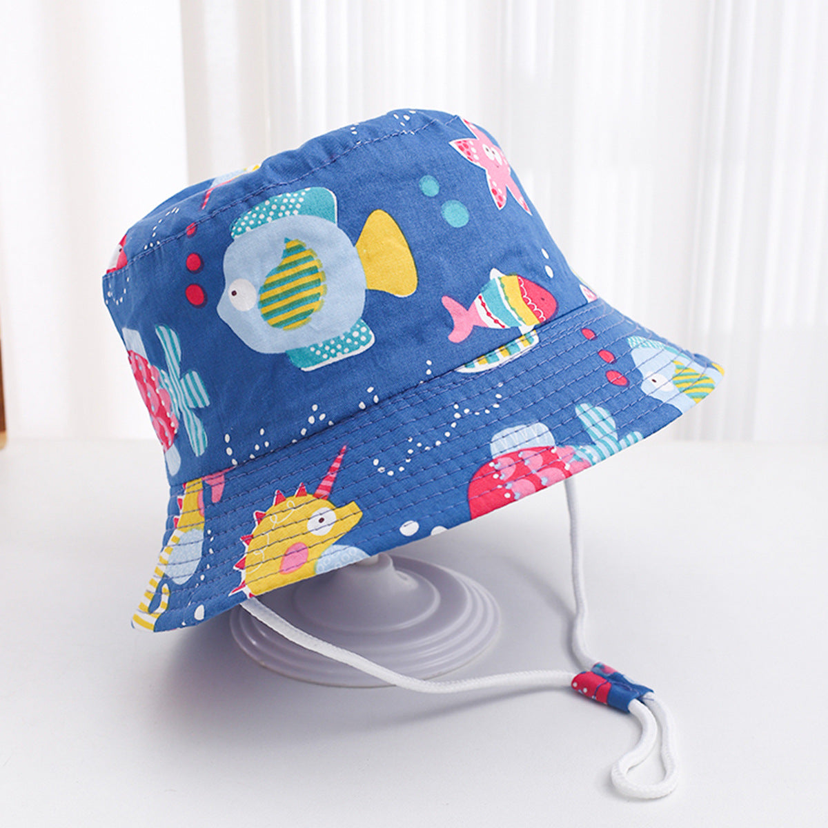 Bob bébé réversible en coton — jugulaire réglable
