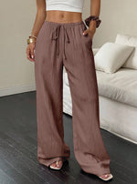 Pantalon large en gaze froissée, taille à cordon