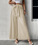 Pantalon large taille haute à ceinture nouée — tissu fluide
