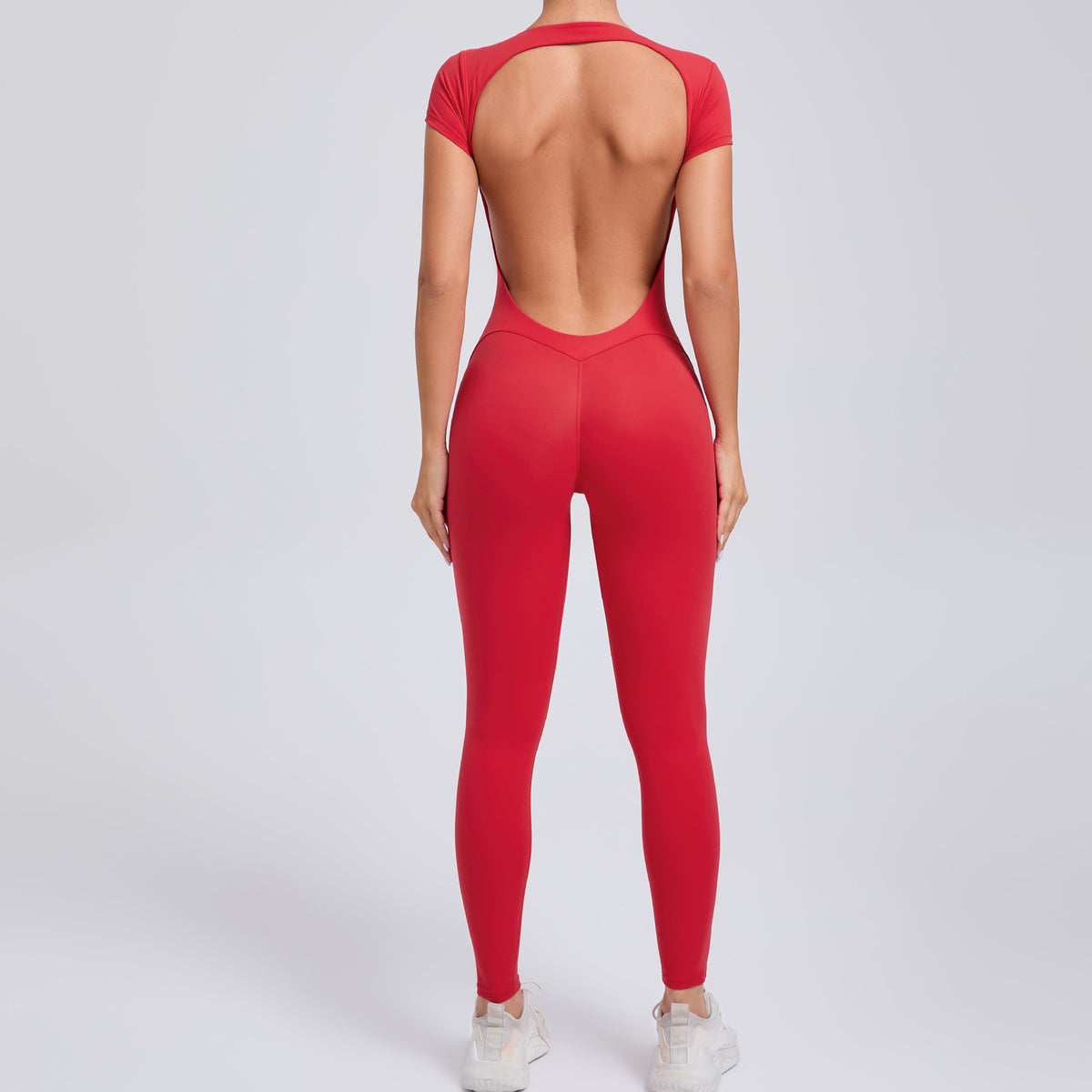 Combinaison de sport à dos ouvert et manches courtes — coloris